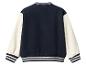 Veste de baseball bleu marine avec manches contrastées crème.