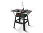 Une scie circulaire de table Parkside verte avec un support noir