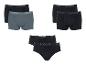 Trois ensembles de sous-vêtements pour hommes : deux ensembles de boxers (noir et gris, et tout noir) et un ensemble de slips noirs.
