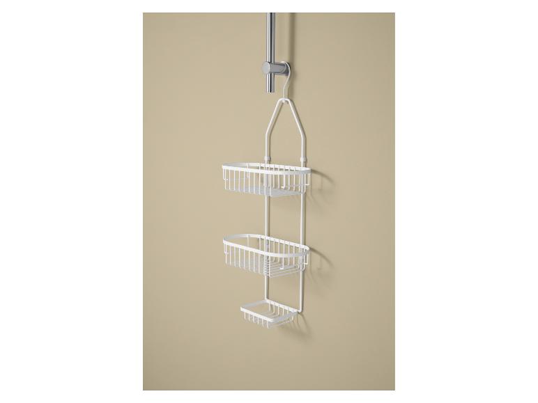 Étagère de douche blanche à trois niveaux suspendue à une barre de douche.