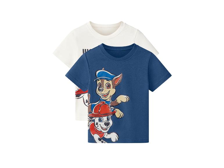 Deux t-shirts pour enfants : un bleu avec la Pat' Patrouille et un blanc rayé.