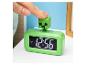 Réveil vert Minecraft Creeper avec une main appuyant sur le dessus