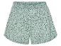 Shorts en jersey vert clair à pois noirs.