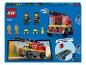 LEGO City Camion de pompiers (60463) avec deux figurines, accessoires de feu et instructions de montage.