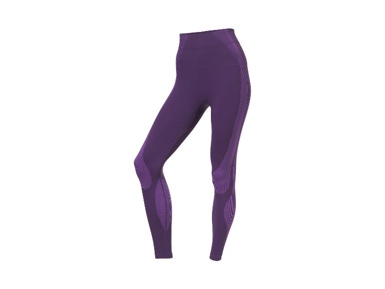 Legging de sport violet taille haute avec détails à motifs.