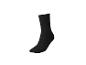 Chaussettes noires côtelées avec un bord volanté.