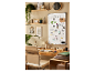 Tableau blanc, bureau en bois et chaise design pour un espace de travail organisé.