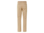 Pantalon beige avec boutons et fermeture éclair.