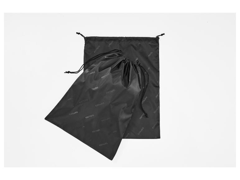 Deux sacs noirs à cordon Esmara, l'un à plat et l'autre froncé, sur fond blanc.