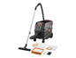 Un aspirateur Parkside noir avec des accessoires, y compris un tuyau, une buse pour le sol et des filtres.