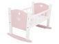 Berceau de poupée en bois rose et blanc avec découpes en forme de cœur et nœud