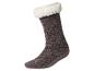 Chaussette marron foncé avec un revers blanc moelleux sur fond blanc.