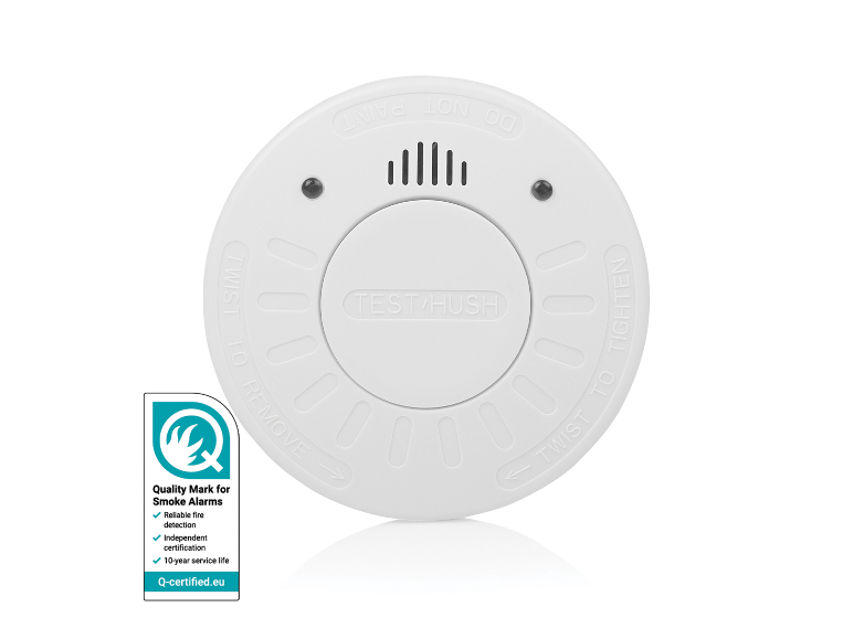 Détecteur de fumée blanc avec bouton 'TEST/HUSH' et marque de qualité.
