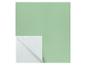 Feuille de papier de soie vert clair avec un coin plié révélant le verso blanc.