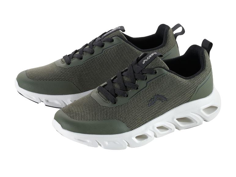 Une paire de chaussures de sport Crivit vert olive avec une semelle blanche.