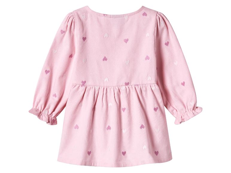 Robe bébé rose avec broderie cœur et manches longues.