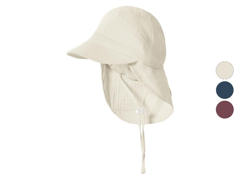 Chapeau de soleil beige pour bébé avec cordons et protège-nuque, avec options de couleur.
