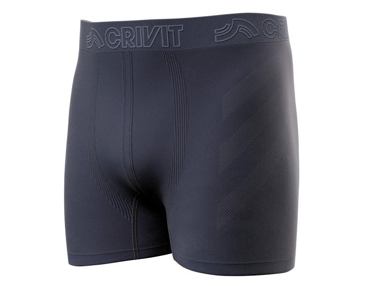 Boxer de sport gris foncé de Crivit avec un design rayé.