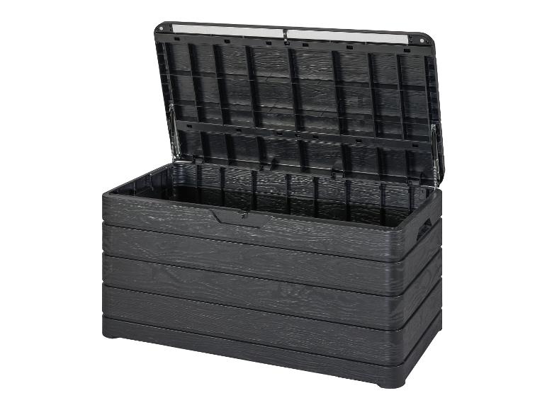 Une boîte de rangement noire avec un aspect bois, ouverte