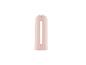 Accessoire de soin personnel rose pâle avec une ouverture centrale.