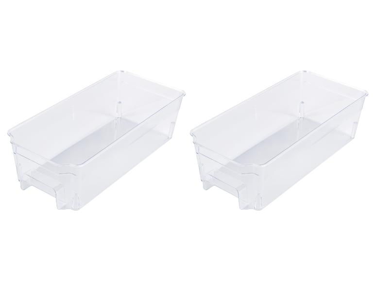 Deux bacs de rangement transparents pour réfrigérateur.