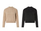 Pulls en maille beige et noir avec un motif torsadé.
