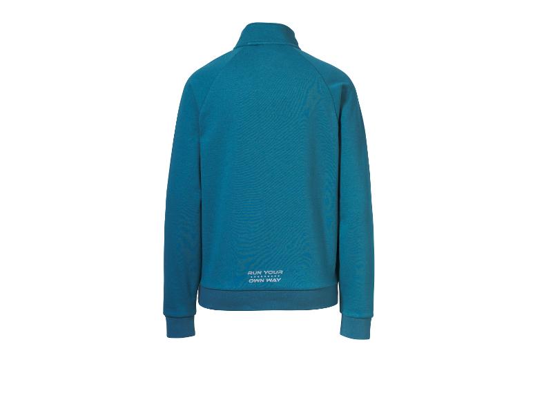 Veste d'entraînement bleu turquoise avec le texte « RUN YOUR OWN WAY » au dos.