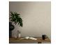 Bureau avec une plante dans un vase noir, un carnet ouvert et une tasse noire.