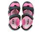Une paire de sandales Lupilu pour enfants, rose et noires.