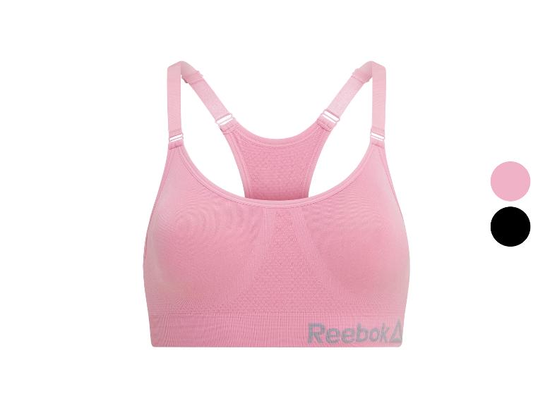 Soutien-gorge de sport Reebok rose avec bretelles ajustables et logo.
