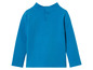 Un t-shirt bleu à manches longues avec des boutons.