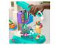 Machine à glace Play-Doh avec pâte à modeler colorée façonnée en glaces et garnitures.