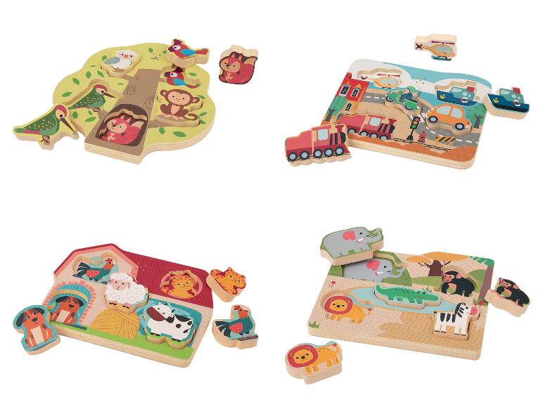 Quatre puzzles en bois avec différents thèmes : forêt, transport, ferme et jungle.