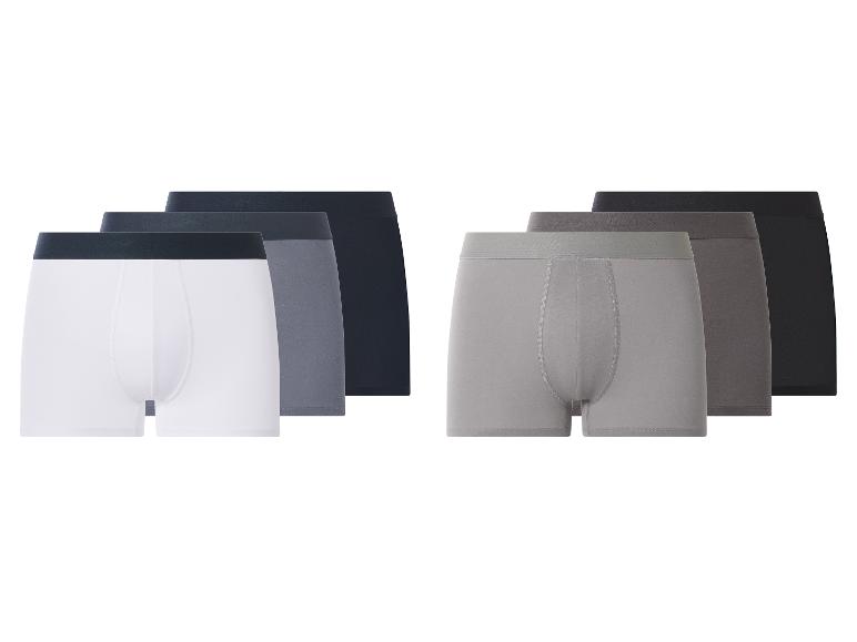 Lot de six boxers pour hommes en blanc, gris et noir.