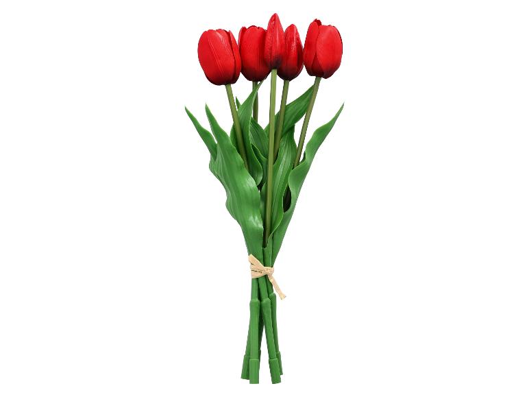 Bouquet de tulipes rouges artificielles avec des feuilles vertes, attaché avec une ficelle.