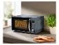 Micro-ondes SilverCrest rétro gris dans la cuisine.