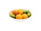 Un bol avec des oranges, des pamplemousses et des citrons verts.
