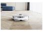 Un aspirateur robot Dreame blanc sur un sol en bois.