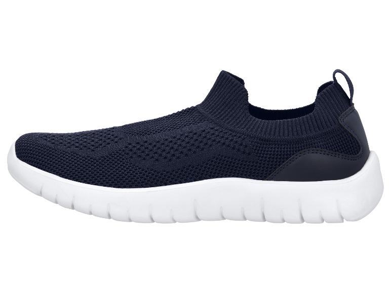 Baskets slip-on bleu foncé avec semelle blanche.