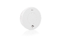 Détecteur de fumée rond blanc avec grille de ventilation et bouton central