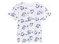 T-shirt enfant blanc à motifs requins stylisés.