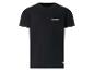 T-shirt noir à manches courtes avec un petit logo blanc sur la poitrine.