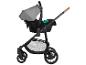 Poussette avec siège auto bébé intégré.