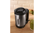 Mixeur à soupe en acier inoxydable avec smoothie vert et fruits.