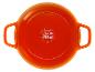 Plat de cuisson rond orange avec poignées et pictogrammes d'instructions d'utilisation