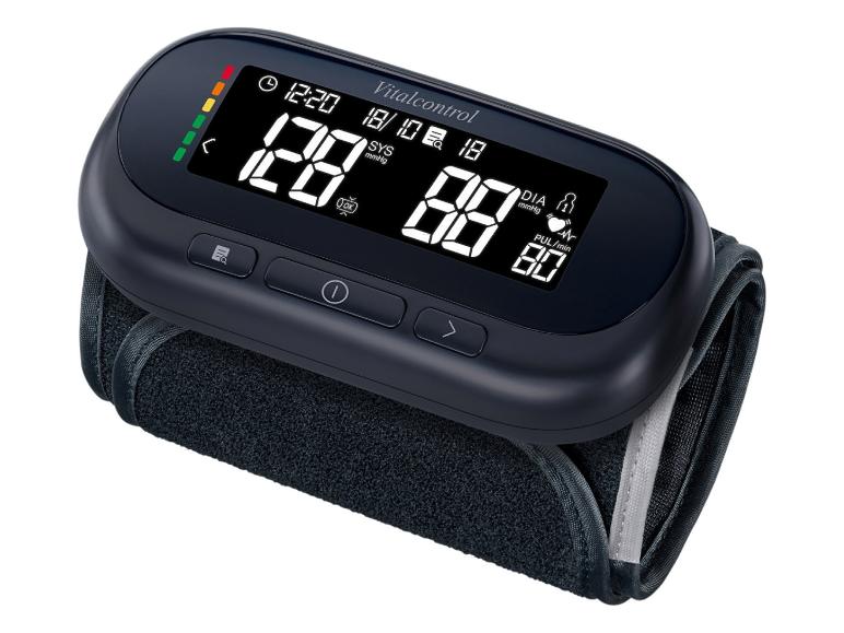 Tensiomètre numérique Vitalcontrol avec brassard, affichant 128/88 mmHg et pouls 80.