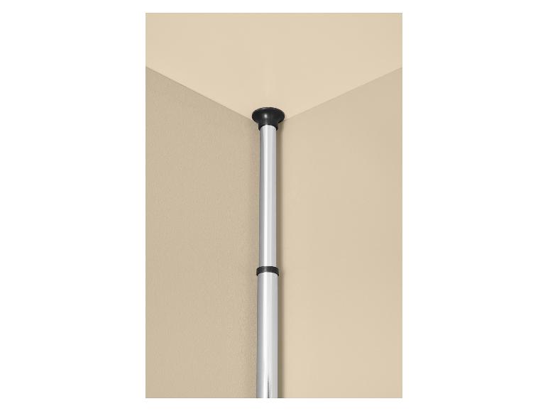 Barre de douche télescopique d'angle, fixée entre le mur et le plafond.
