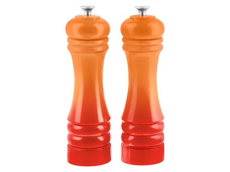 Deux moulins à poivre ou à sel orange et rouges avec un dégradé de couleurs