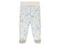 Pantalon pour bébé avec un imprimé de girafes, d'éléphants et de tigres.