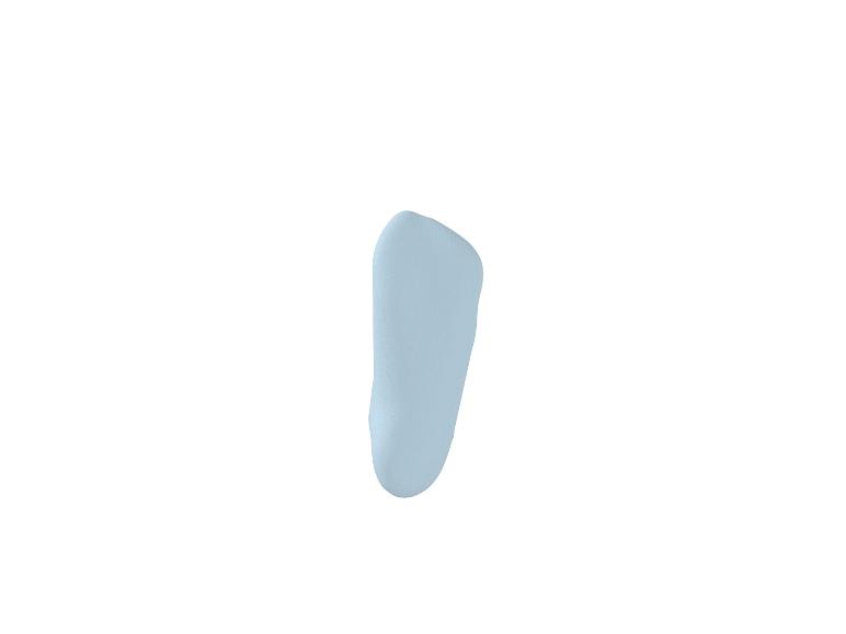 Une forme bleu clair, allongée et irrégulière, peut-être un échantillon de produit cosmétique ou un objet doux.